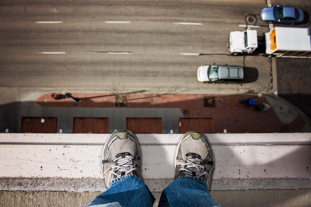 Standing on top of a building looking down Acrophobia