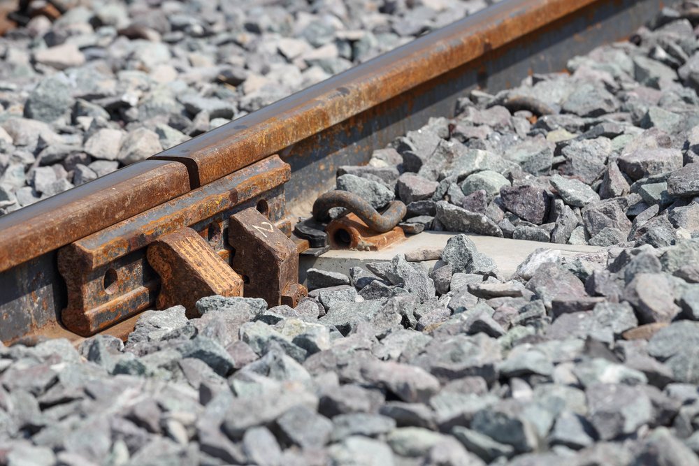 Why do railway tracks have crushed stones alongside them? - Alpha Rail