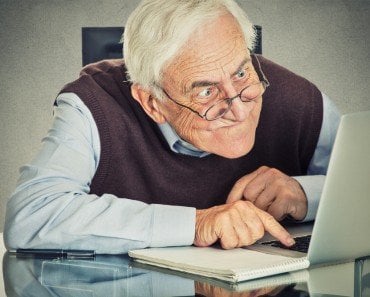 old man and laptop