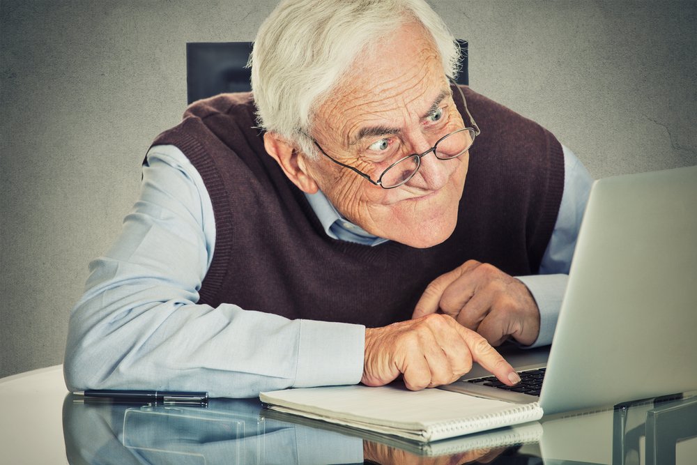 old man and laptop