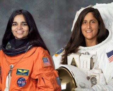 Astronauts with different spacesuits