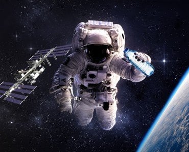 Astronaut & water bottle in space