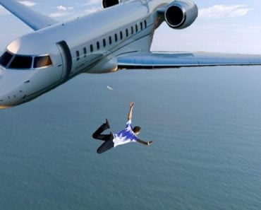 Man jumping from an airplane without parachute