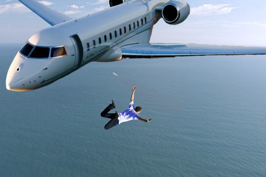 Man jumping from an airplane without parachute