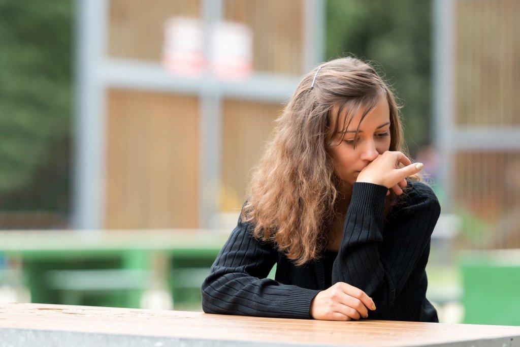 Sad alone girl single thinking sitting