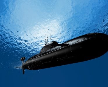 The military ship in the sea submarine