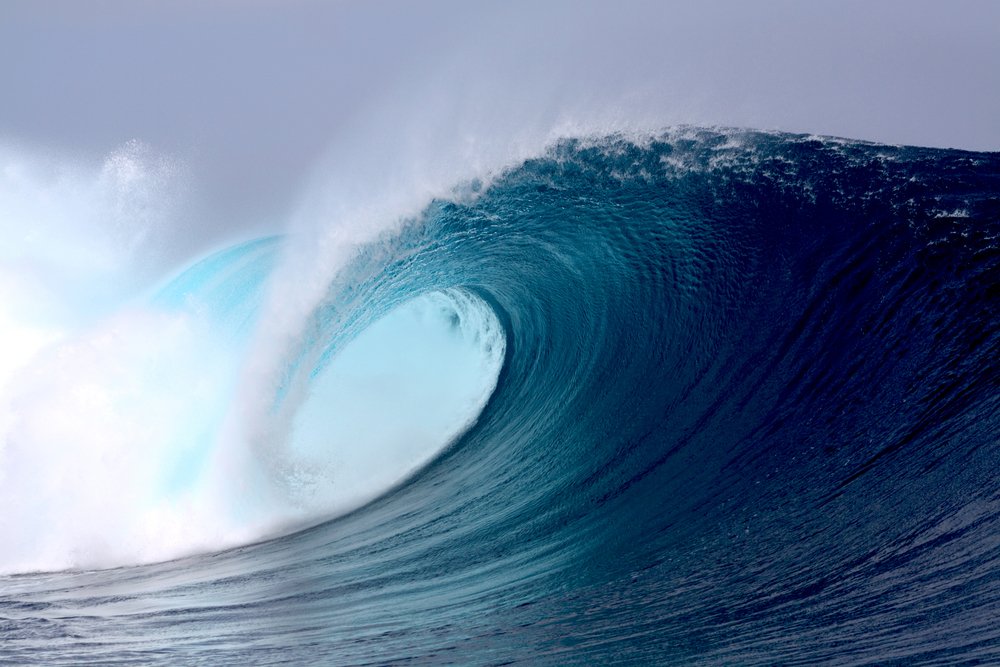 Tropical blue surfing wave ocean sea