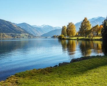 Amazing landscape of alpine lake with crystal clear green water and Perfect blue sky.Image( Yevhenii Chul)s