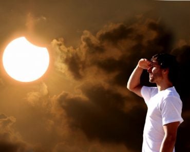 Guy looking Eclipse with naked eye