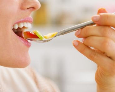 Closeup on woman testing fruits