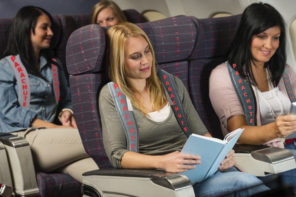 Parachute wearing airplane passenger