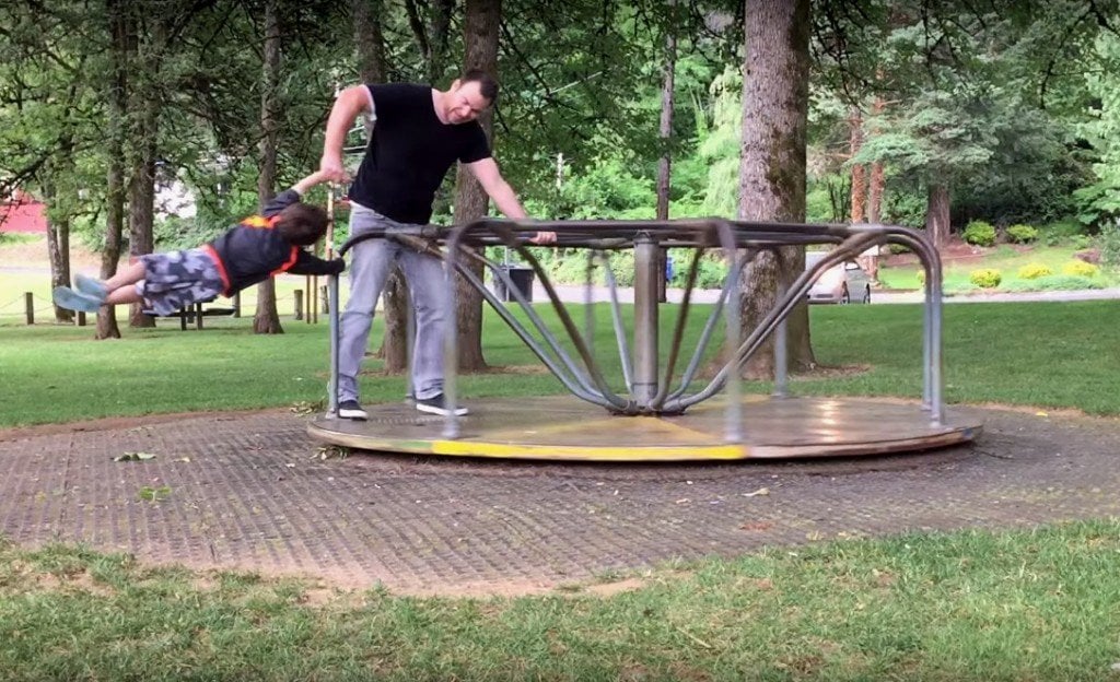 KID FLIES OFF MERRY GO ROUND