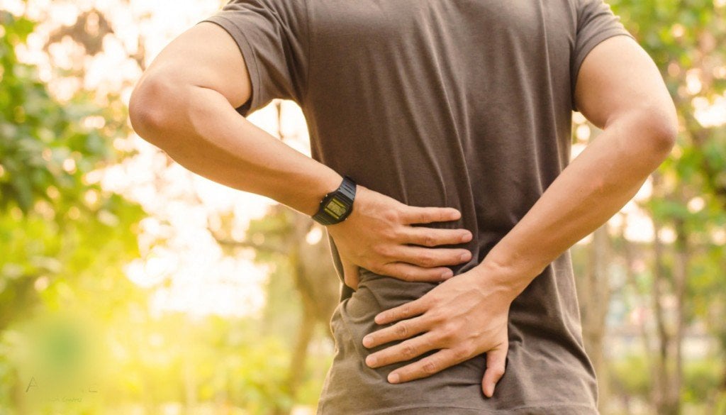 Sport injury backpain rubbing