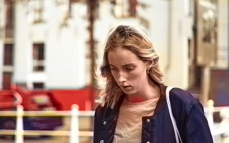 Stress girl walking on road