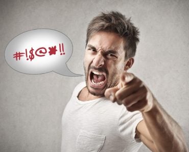 Swearing featured image Portrait of a angry young man