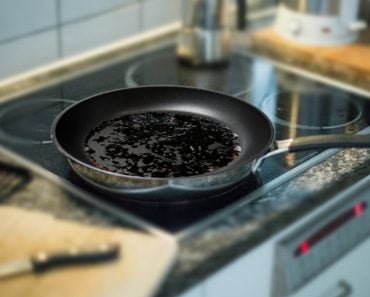 Burnt food in a pan in a kitchen
