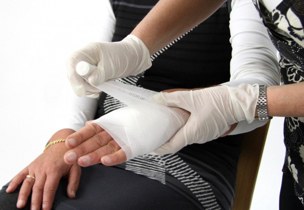 Dressing injured hand medicine health care hospital bandage