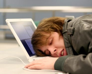 tired employee, worker sleeping on desk, frusted worker