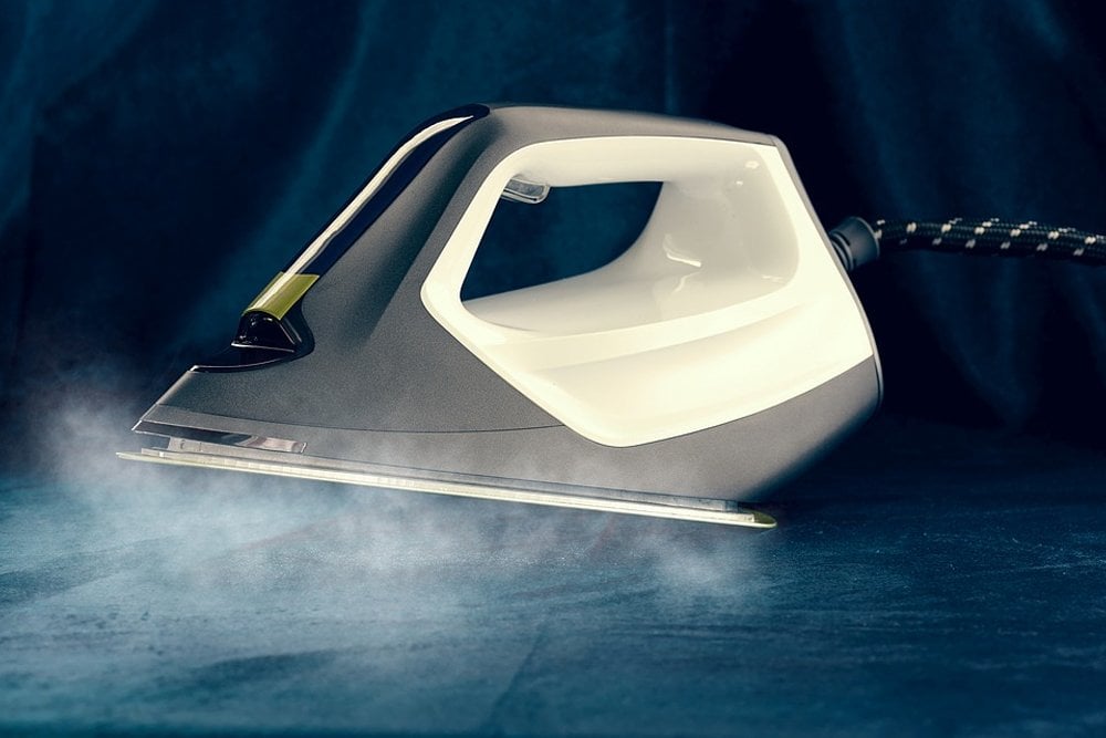 What Causes a Steam Iron to Spit Water All Over the Clothes?