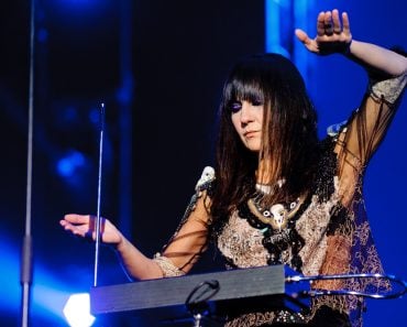 BARCELONA DECEMBER 29 Eva Amaral singer of Amaral band playing a theremin at the Fnac Music Festival in Palau Sant Jordi on December 29, 2011 in Barcelona, Spain. Image(catwalker)s