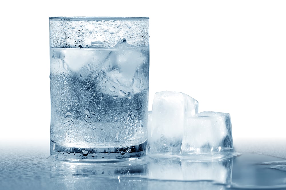 Glass of very cold water with ice cubes. Isolated with clipping path - Image(cosma)s