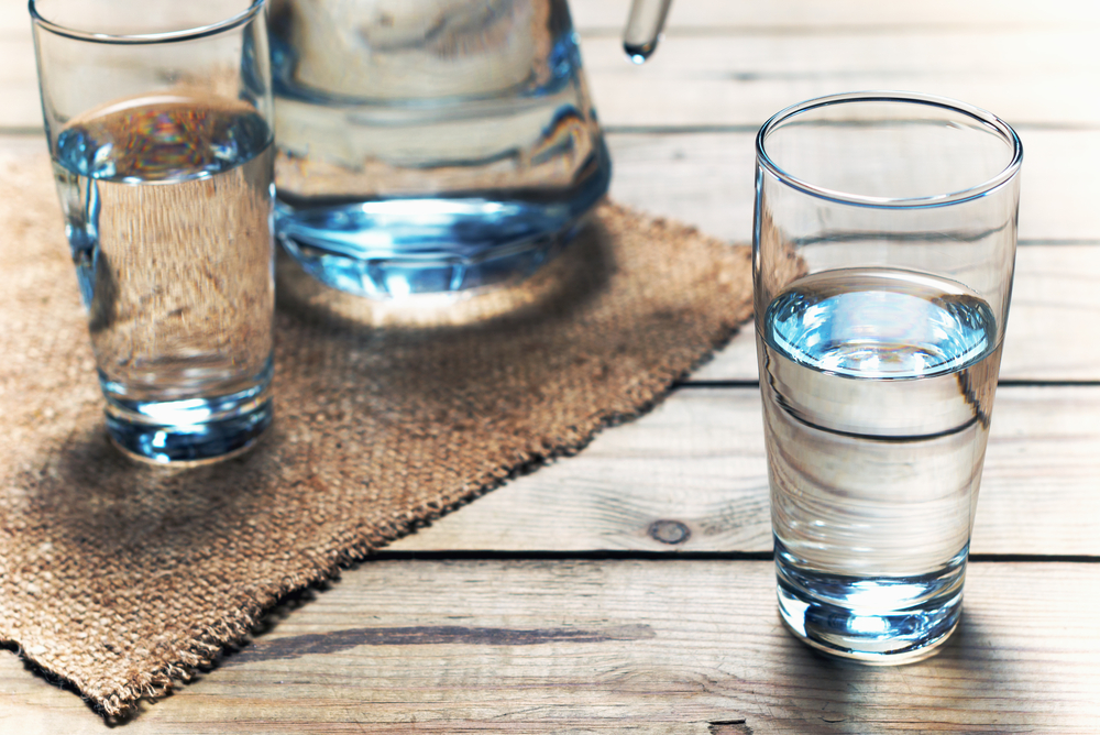 Glasses of water on a wooden table. Selective focus. Shallow DOF - Image( SedovaY)s