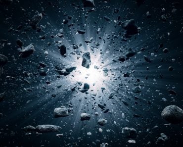 Rocks and debris flying through space after a huge big bang explosion 3D render Illustration (Johan Swanepoel)s