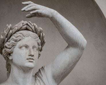 Statue of sensual Roman renaissance era woman in circlet of bay leaves, Potsdam, Germany - Image( Oleg Senkov)