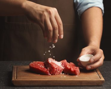 Chef cooking meat on table - Image( Africa Studio)s