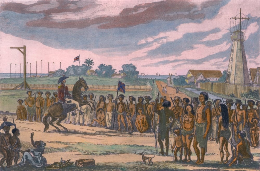 Natives of the colony of British Guiana are reviewed prior to their clean up operations( Everett Historical)s
