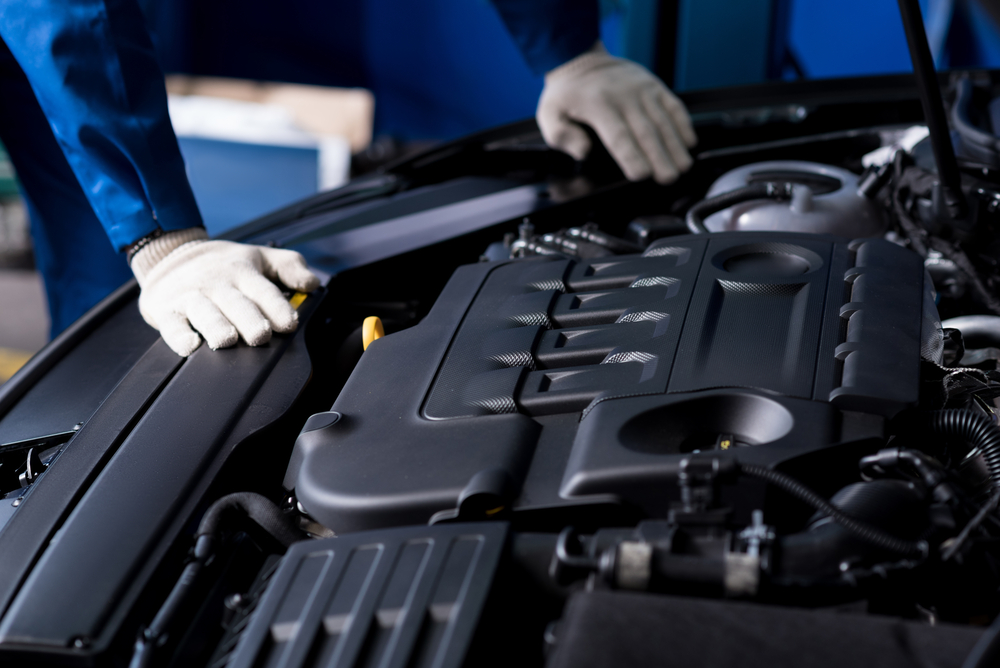 Professional mechanic checking car engine - Image( YAKOBCHUK VIACHESLAV)S