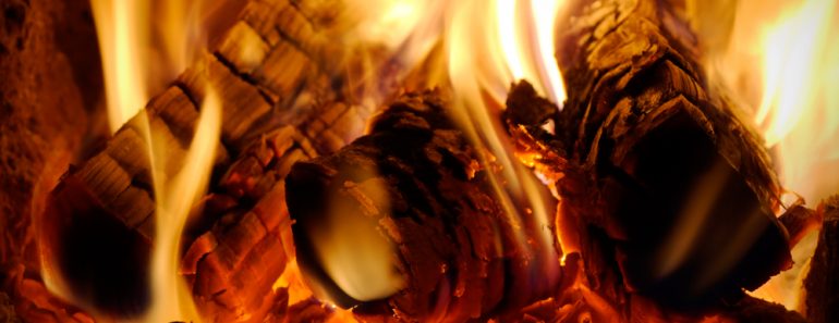 crest of flame on burning wood in fireplace(Sinelev)s