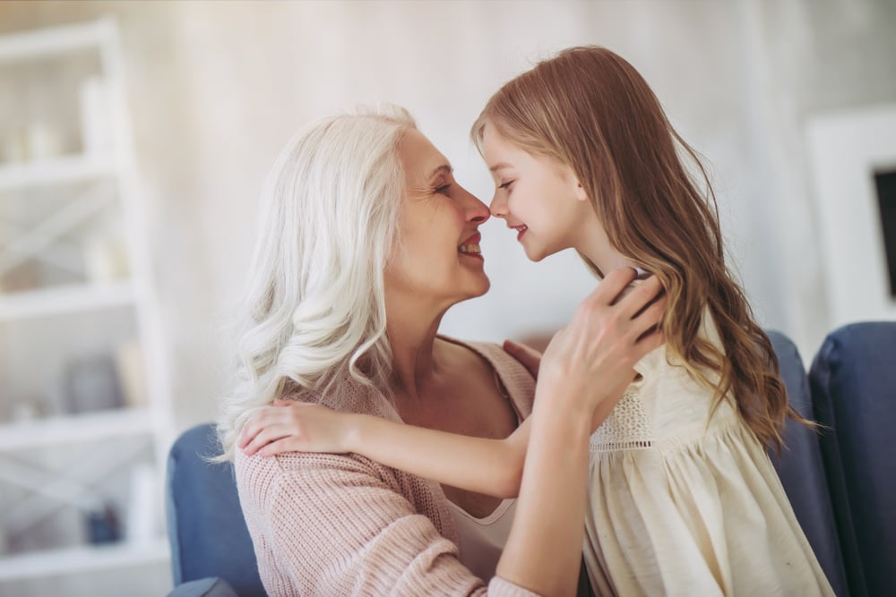 Little cute girl and her grandmother are spending time together at home(4 PM production)S