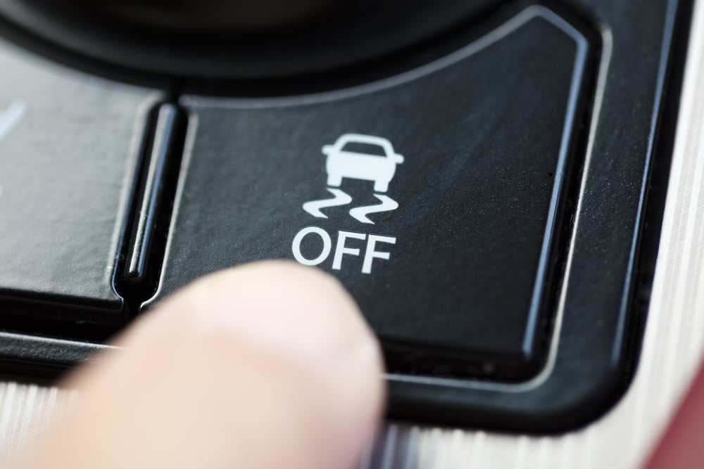 finger pressing Traction Control System button(Tom Wang)S