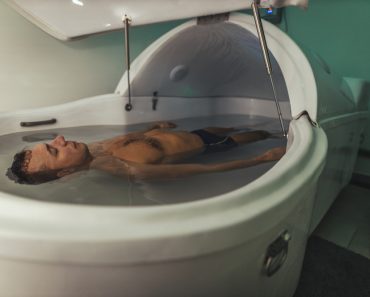 Relaxed man is floating in a sensory deprivation tank(MilanMarkovic78)S
