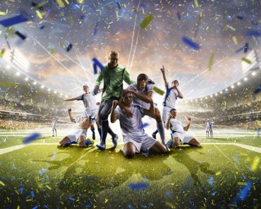 Collage adult soccer players in action on stadium panorama(Eugene Onischenko)s