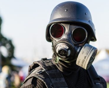 Police In Body Armour and gas mask(Nate Clark Images)S