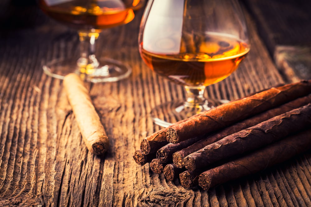 quality cigars and cognac on an old wooden table(Adrian_am13)s