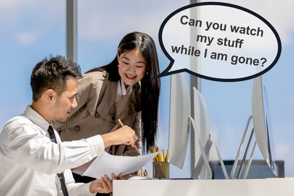 Young Asian businessmen are working together in a modern office. There are many modern computers placed on the table