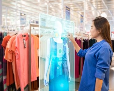 happy girl try to use smart hologram display with virtual augmented reality in the shop(Fit Ztudio)S