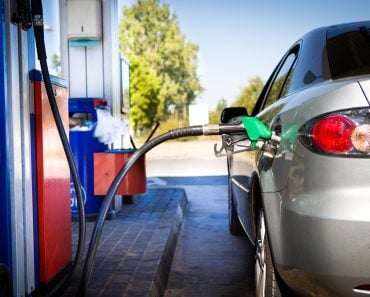 Car,Refueling,On,A,Petrol,Station.