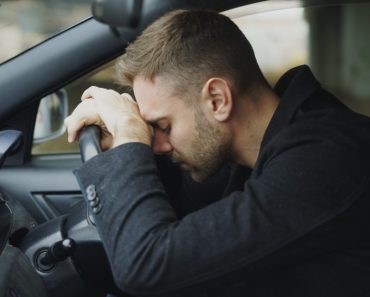 Young,Man,Sitting,Inside,Car,Is,Very,Upset,And,Stressed