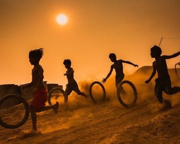 children playing with tire