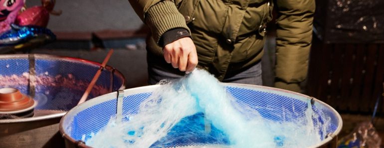 person-making-blue-cotton-candy_t20_BmzwzO
