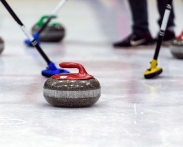 close-up-of-a-curling-game-situation-8SQNG8D