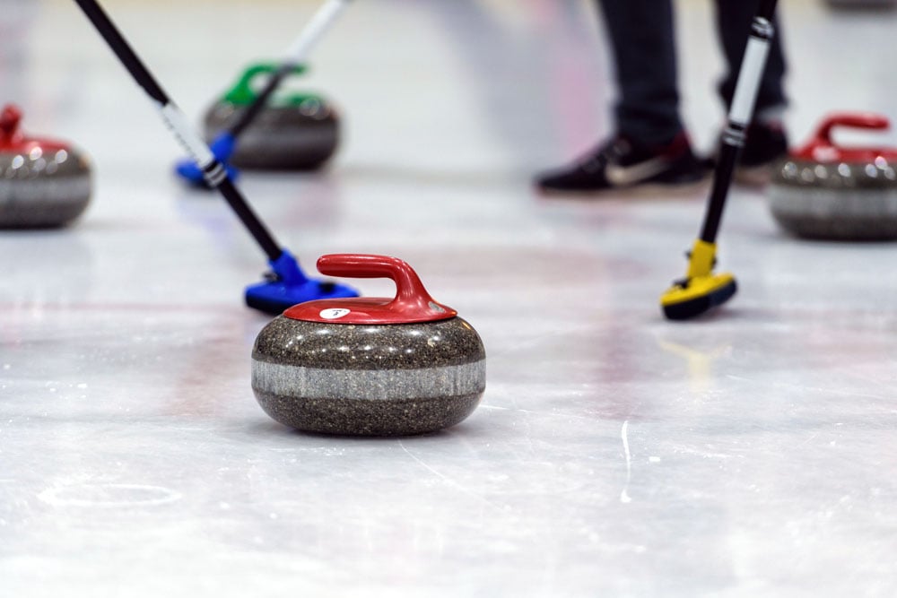 close-up-of-a-curling-game-situation-8SQNG8D