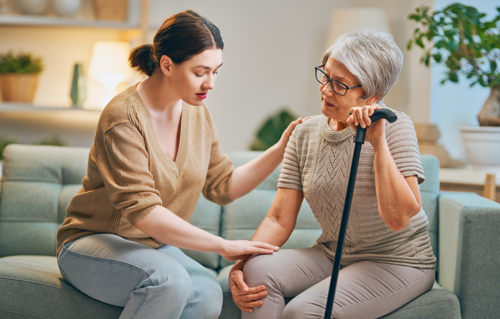 Elderly patient and caregiver