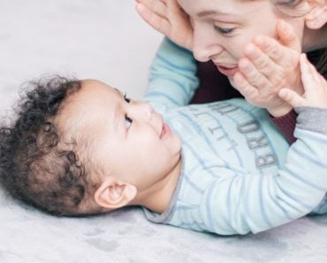 development-bonding-baby-smile-play-mom-peekaboo-milestones-mixed-race-family-moments_t20_9k3eWN