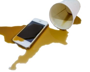 Modern,Smartphone,With,Hot,Coffee,Cup,Wet,,accident.