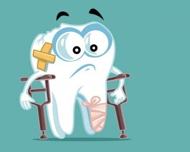 Strong cartoon tooth with a glass of milk and muscles